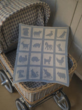 Hand-Crafted Knitted Baby Blanket with Animal Motifs